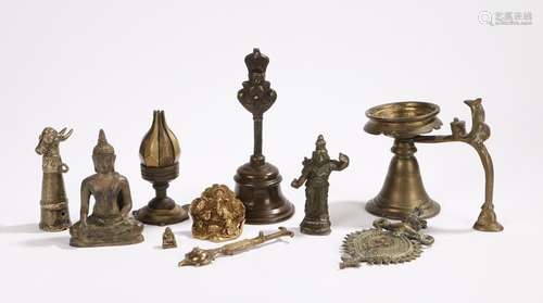 19th and 20th Century Indian devotional objects to include a metal folding petal lamp, Buddha,