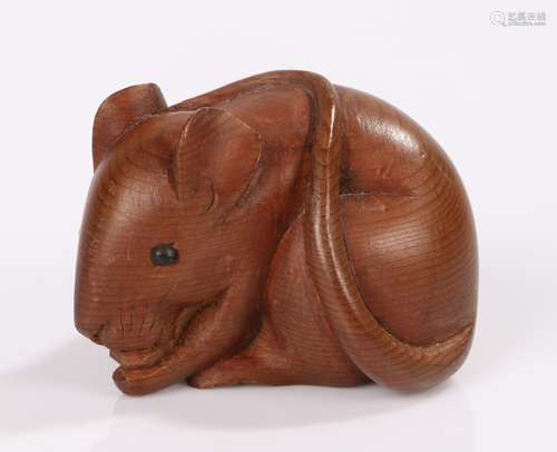 Japanese Meiji period carved boxwood rat, Hida school, with it's tail curled around it's back,