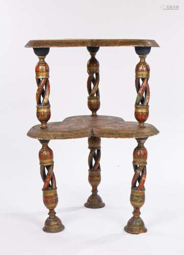 Kashmiri table, the trefoil shaped top decorated with deities and dancing figures on pierced twisted