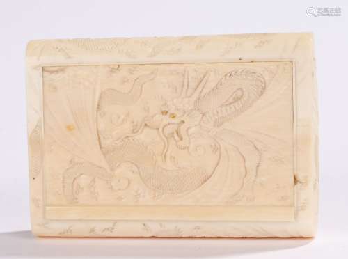 Japanese Meiji period ivory box, with a hinged lid and carved dragon set with mother or pearl