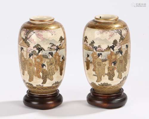 Pair of Japanese Meiji period Satsuma vases of small proportions each decorated with two panels