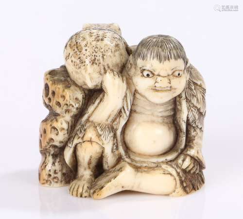 Japanese Meiji period netsuke, the netsuke carved as Gama Senni seated by a rocky outcrop and with a