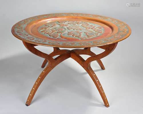 Early 20th Century Syrian copper table, with a foliate pierced dish top, raised upon an ivory inlaid