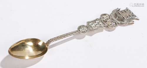 Chinese silver teaspoon, the finial depicting the crest of the army ordnance corps above Chinese