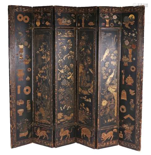 Chinese five fold lacquered and gilt heightened floor screen, each panel decorated with varying