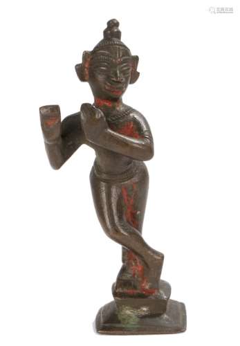 19th Century Indian bronze figure of Krishna Venugopala standing with one leg over the other, over a
