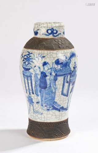 Chinese porcelain vase, in blue and crackle glaze showing a figural scene of people bringing flowers