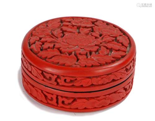 Chinese Qing cinnabar lacquer box, the circular lidded box decorated to the sides and lid with