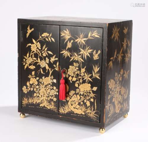 Japanese Meiji period lacquered kodansu (table cabinet) the rectangular top with gilt and red