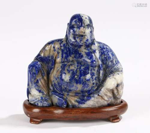 Lapis lazuli Budai, in seated position on a stand, 9cm wide