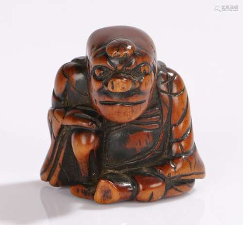 Japanese Edo period carved netsuke, as a figure with a large nose, 4cm high