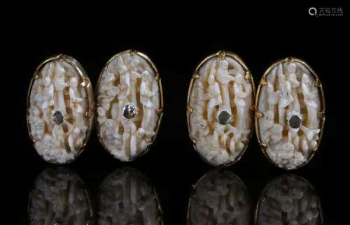 Pair of Canton ivory and gold cufflinks the ivory delicately carved with figures in a landscape.