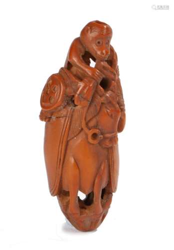 Edo period ojime the ojime of pierced boxwood depicting a monkey riding a horse, length 4cm