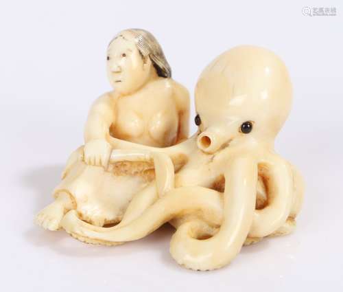 Japanese Edo period netsuke, the ivory netsuke depicting an Ama and octopus, signature to the