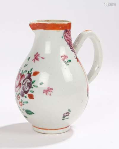 Chinese sparrow beak jug, the body with foliate decoration and loop handle, 12cm high