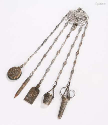 Late 19th century Indian chatelaine of polished steel, the clip depicting Buddha between two