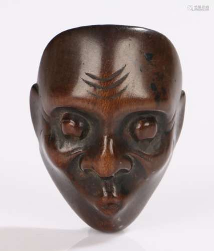 Japanese Edo period boxwood noh mask, carved with pert lips, signed to the back, 4.6cm high