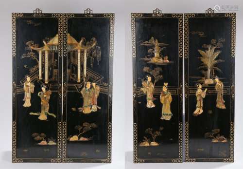 Set of four black lacquer panels, with figures surrounding a pagoda and figures in a garden, 31cm