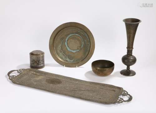 Indian metal ware, to include a long foliate decorated tray, a tall vase, a cannister and lid, a