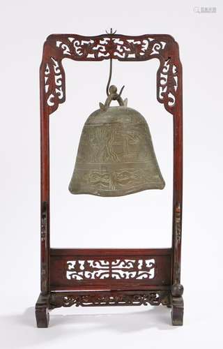 Chinese gong, with a bell shaped foliate decorated gong held within the fretwork frame, the frame