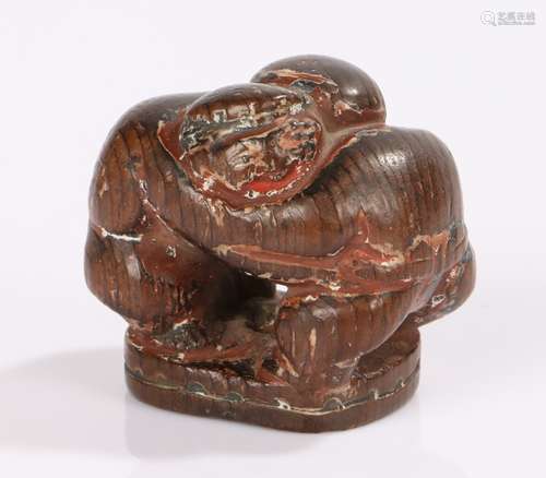 Japanese Meiji period carved netsuke, the netsuke of cypress wood and carved as wrestlers, with