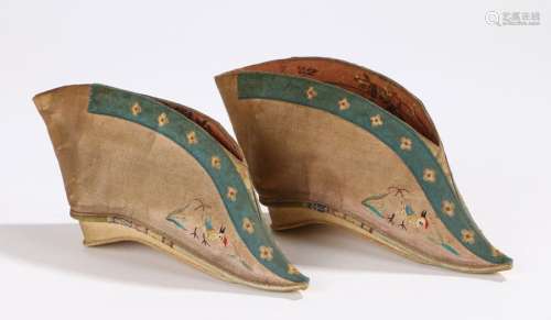 Pair of Xuantong Chinese slippers for bound feet, the resultant feet now as lotus feet, the slippers