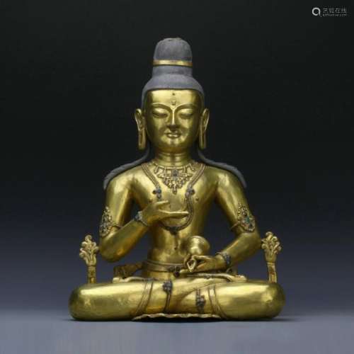 A gilt bronze Buddha statue