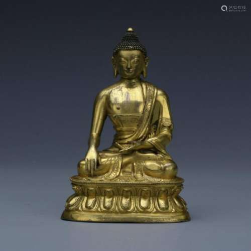 A gilt bronze figure of Sakyamuni