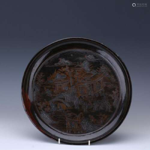 A black lacquer carved landscape plate