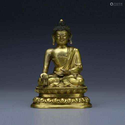 A gilt bronze figure of Sakyamuni