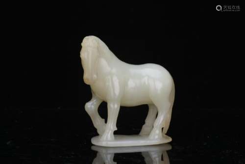 A white jade carved horse figure
