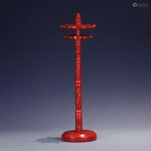 A cinnabar carved pen stand