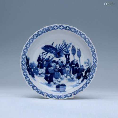 A blue/white figures plate