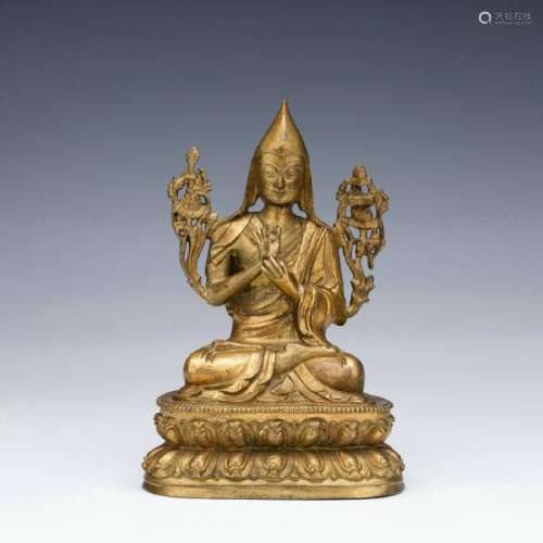 A gilt bronze figure of Tsong Khapa