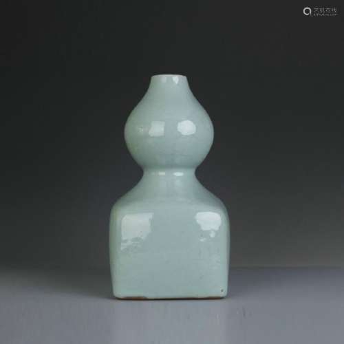 An old celadon glazed gourd vase