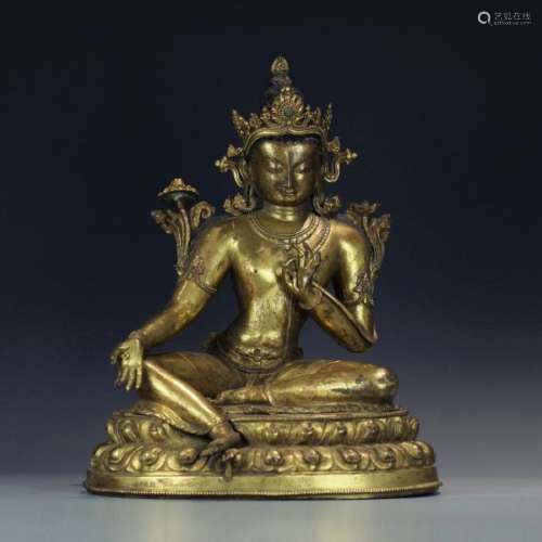 A gilt bronze figure of Syamatara