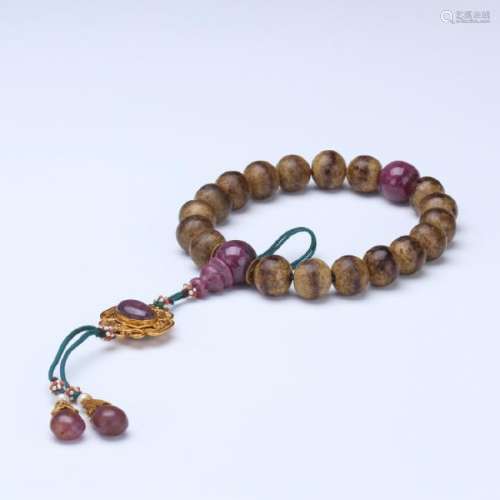 An agarwood 18 beaded rosary