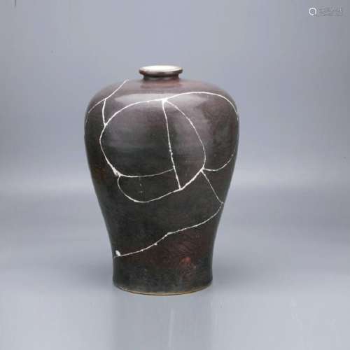 An old brown glazed meiping vase