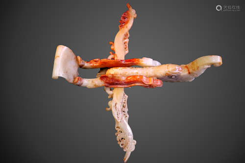 A CARVED HETIAN JADE CROSSBOW
