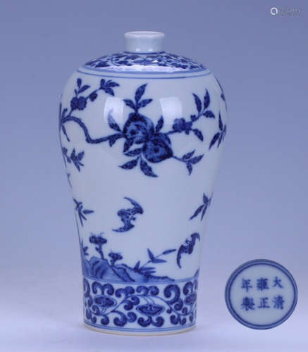 A BLUE AND WHITE GLAZE CASTED FLORAL PATTERN VASE