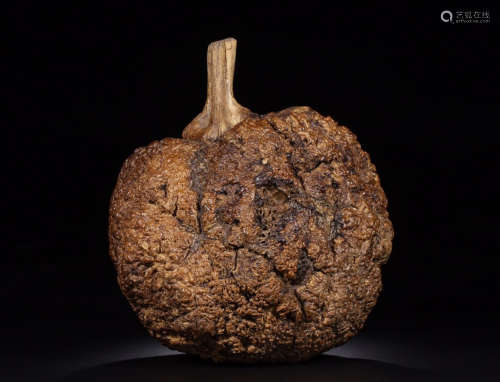 A TREE TUMOR CARVED PUMPKIN SHAPED ORNAMENT