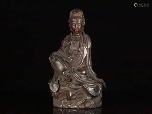 A GILT BRONZE GUANYIN ORNAMENT