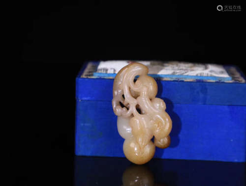 A HETIAN JADE CARVED CHILD PENDANT