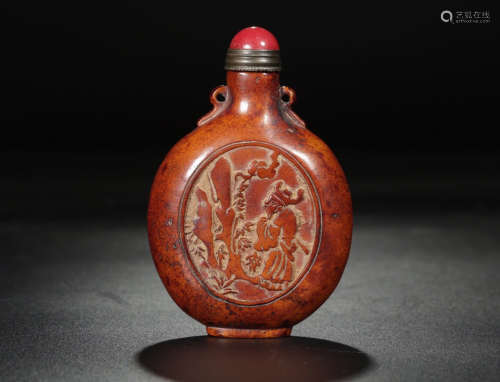 A LUJIAO CARVED SNUFF BOTTLE