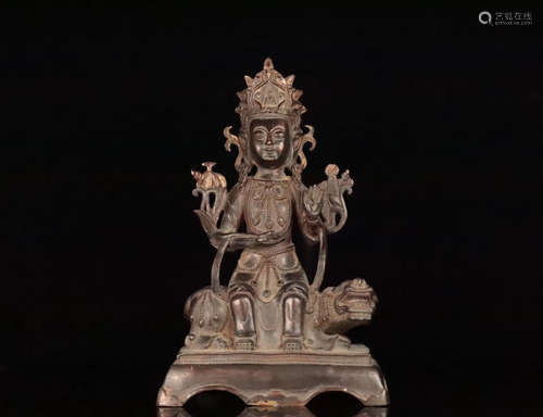 A TIBETAN GILT BRONZE BUDDHA