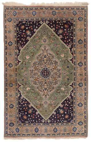 A FINE QUM RUG.