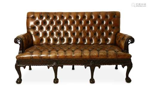 A FINE BROWN LEATHER BUTTON-UPHOLSTERED THREE SEATER SETEE.