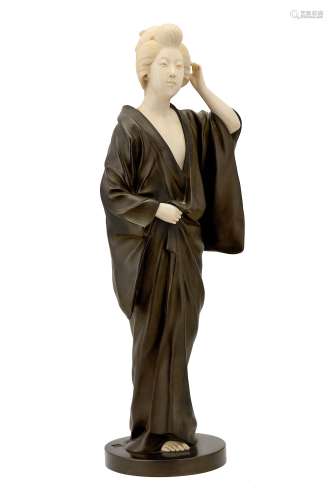 A LARGE JAPANESE BRONZE AND IVORY FIGURE OF A BEAUTY.