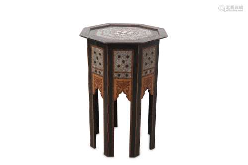 A HARDWOOD EBONISED AND MOTHER OF PEARL INLAID OCCASIONAL TABLE.