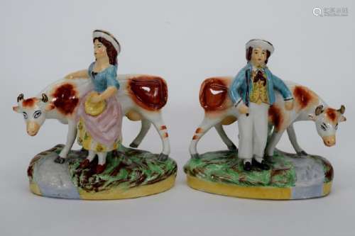 PAIR STAFFORDSHIRE PORCELAIN FIGURINES OF COWS